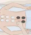 hacer un masaje con piedras calientes