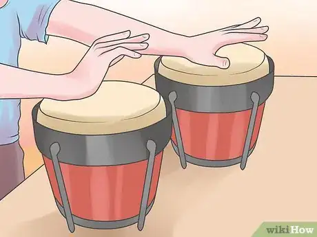 Imagen titulada Play the Bongos Step 12