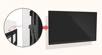 instalar un televisor de plantalla plana en una pared de panel de yeso