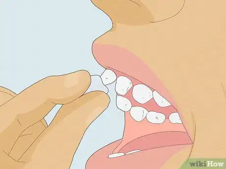 Imagen titulada Pull a Loose Tooth at Home Step 3