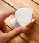 hacer una rana saltarina de origami con una ficha de cartulina