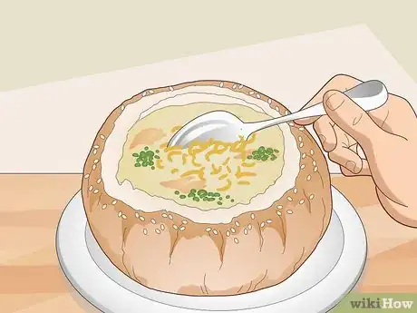 Imagen titulada Eat Soup Served in a Bread Bowl Step 2