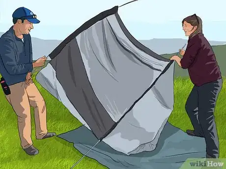 Cómo secar la ropa al aire libre (con imágenes) - wikiHow