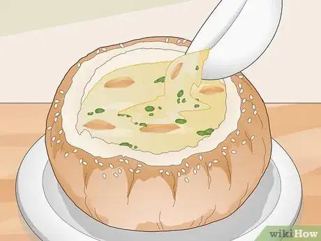 Imagen titulada Eat Soup Served in a Bread Bowl Step 7