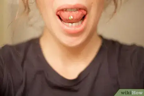 Imagen titulada Take Care of Your New Mouth Piercing Step 3