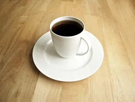 Imagen titulada Black Coffee for Breakfast in White Porcelain Cup