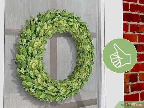 Imagen titulada Hang a Wreath on a Storm Door Step 6