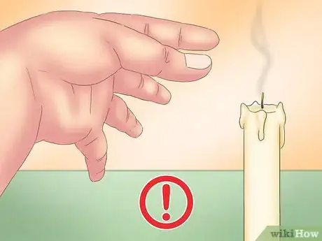 Imagen titulada Put Out a Candle with Your Fingers Step 5