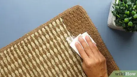 Imagen titulada Get Adhesive out of Carpet Step 1