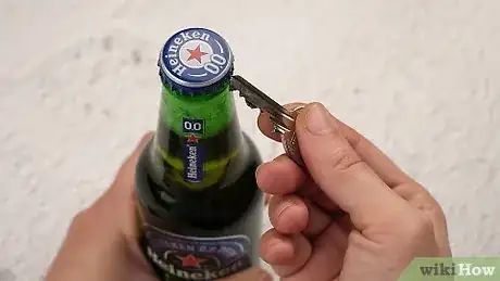 Imagen titulada Open a Beer Bottle with a Key Step 2