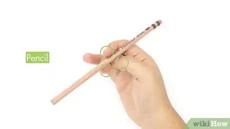 Imagen titulada Spin a Pencil Around Your Thumb Step 1