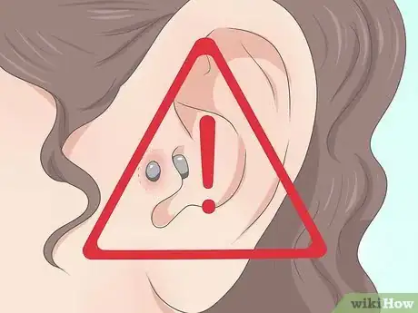 Imagen titulada Pierce Your Own Tragus Step 14