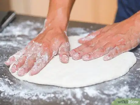 Imagen titulada Toss Pizza Dough Step 10