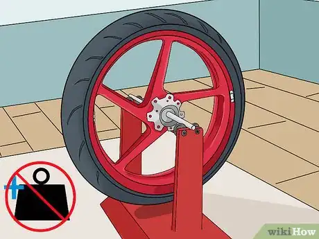 Imagen titulada Balance a Motorcycle Tire Step 12