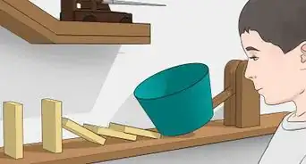 construir una máquina de Rube Goldberg casera