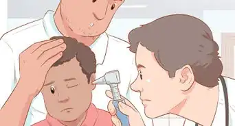 quitar un objeto de la oreja de un niño