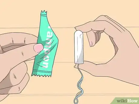 Imagen titulada Insert a Tampon for the First Time Step 4