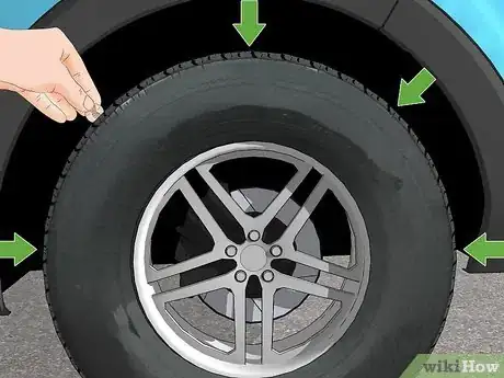 Imagen titulada Check Tire Tread with a Penny Step 6