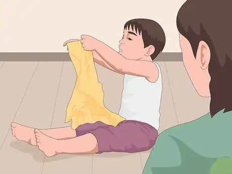 Imagen titulada Teach Children to Put a Sock on a Foot Step 6