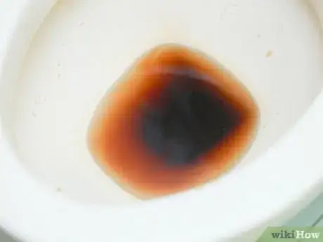 Imagen titulada Clean a Toilet with Coke Step 3