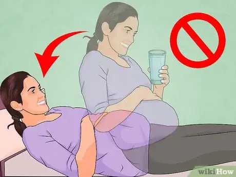 Imagen titulada Lie Down in Bed During Pregnancy Step 2