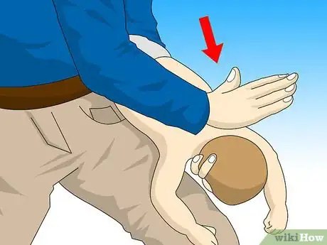 Imagen titulada Do First Aid on a Choking Baby Step 6