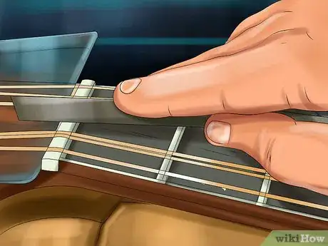 Imagen titulada Lower the Action on an Acoustic Guitar Step 11