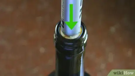 Imagen titulada Open a Wine Bottle Without a Corkscrew Step 3