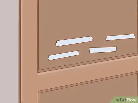 Imagen titulada Stop a Cat from Scratching the Door Step 6