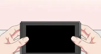 abrir el pie de apoyo del Nintendo Switch