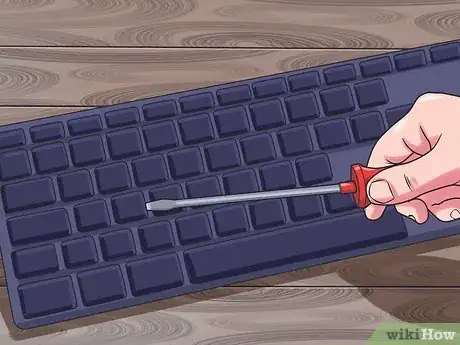 Imagen titulada Clean Under Laptop Keyboard Keys Step 1