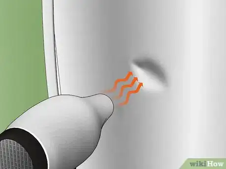 Imagen titulada Remove a Dent from a Stainless Steel Refrigerator Step 1