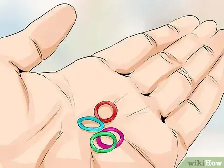 Imagen titulada Connect a Rubber Band to Your Braces Step 12