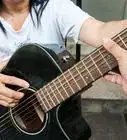 escribir una canción con acordes de guitarra