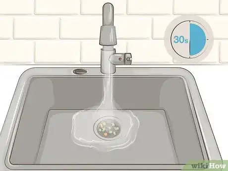 Imagen titulada Maintain a Garbage Disposal Step 5