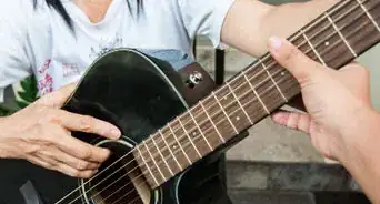 escribir una canción con acordes de guitarra