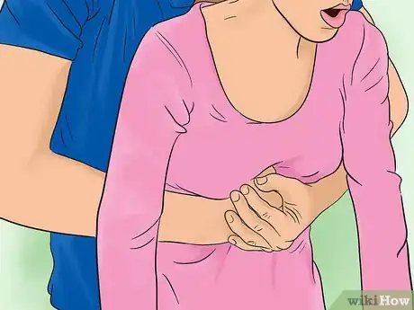 Imagen titulada Perform the Heimlich Maneuver Step 4