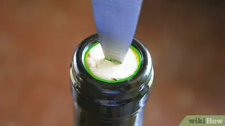 Imagen titulada Open a Wine Bottle Without a Corkscrew Step 6