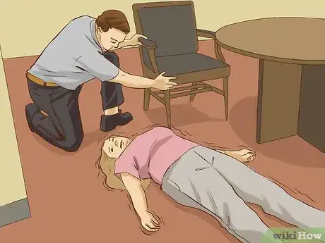 Imagen titulada Avoid Injury During an Epileptic Seizure Step 12