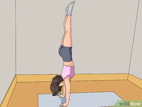 Imagen titulada Work up to a Handstand Push Up Step 7