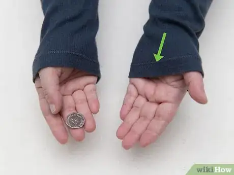 Imagen titulada Make a Coin Disappear Step 15