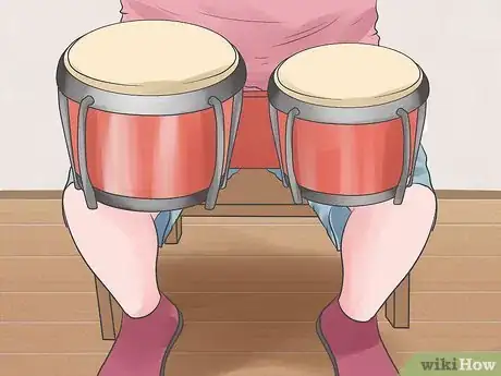 Imagen titulada Play the Bongos Step 6