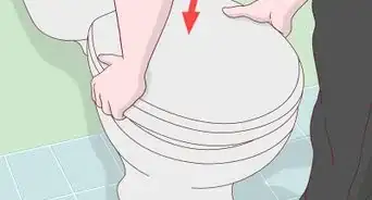 réparer un siège de toilette desserré
