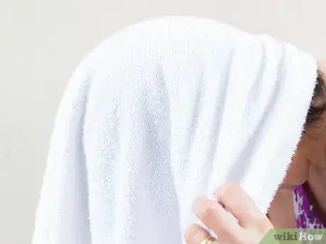 Image intitulée Create a Turban With a Towel to Dry Wet Hair Step 7