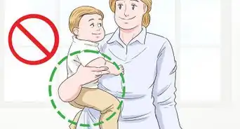 soulever et porter un bébé
