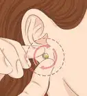 insérer une boucle d'oreille alors qu'elle n'entre plus dans le trou