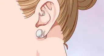 cacher un piercing à l'oreille