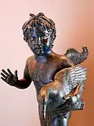 Bronze Cupid clutching a goose