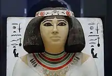 Statue of princess Nofret wearing a wig (c. 2613 to 2494 BC.)