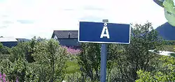 View of the sign at the entrance to the village